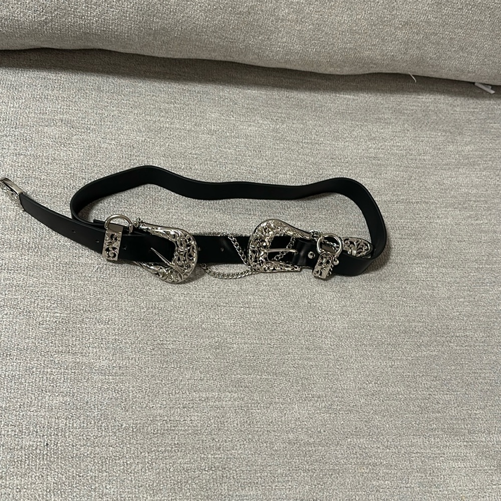 Black Nasty Gal high waisted woman’s belt with silver buckles